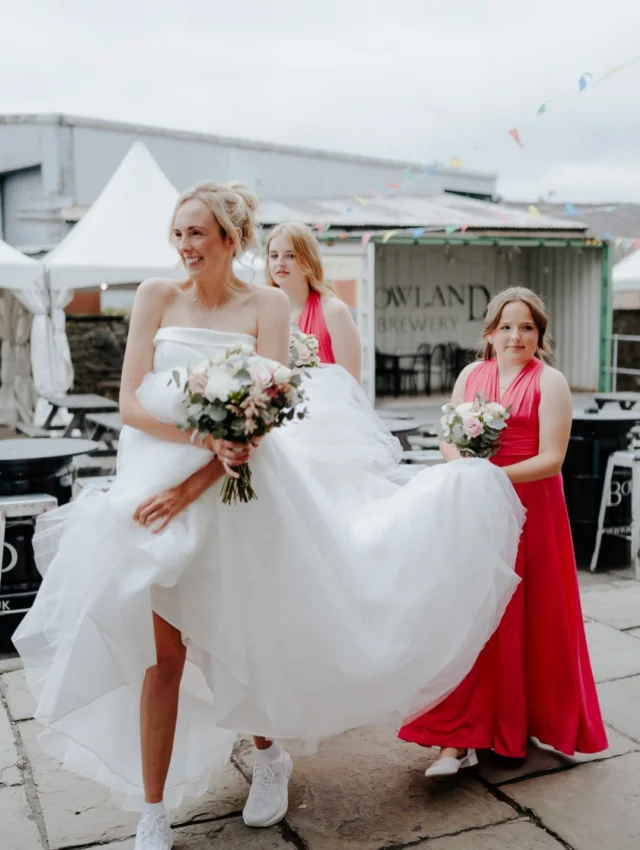 Dress scrunched up. Fresh white trainers on. Bouquet in hand. Just heading off to get married. 🤍

Currently editing this absolute beauty from Holmes Mill and I’m obsessed.

It had been raining, but she was just having the best day. The girls were helping with the dress, everyone was smiling, and she was completely in the moment.

This is exactly why I love documentary wedding photography. The unplanned moments.

That’s the goal. Just having the best day. That’s the stuff I’ll always be looking for.

If this is your kind of wedding, I think we’ll get on just fine. 🤍
Xxxxx

#SarahGlynnPhotography #HolmesMillWedding #DocumentaryWeddingPhotographer #RockstarBride